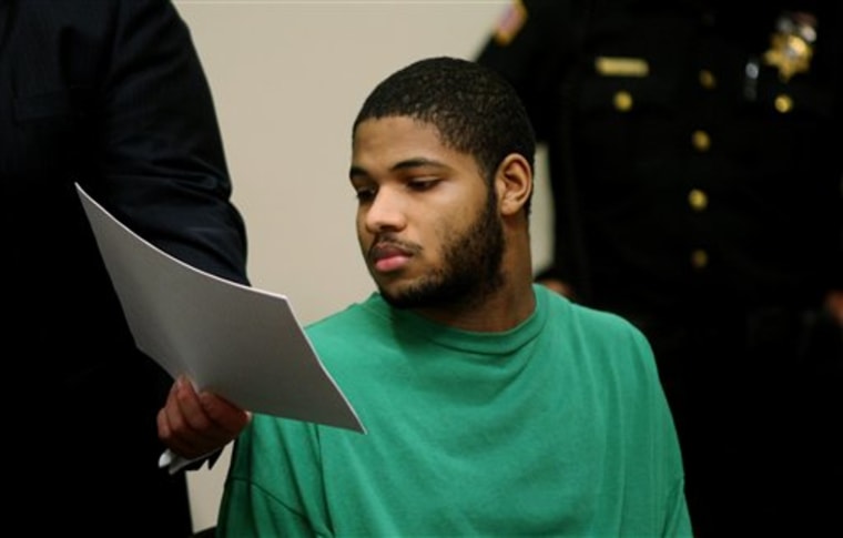 Shamsid-Din Abdur-Raheem sits beside his attorney Richard Klein, on Tuesday, while being arraigned by Judge Frederick DeVesa in State Superior Court in New Brunswick, NJ.